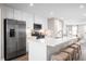 Sleek kitchen boasting stainless steel appliances and a large island at 2341 Elowen Ln. # 11E, Longs, SC 29568