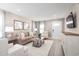 Bright living room featuring a comfortable seating area and hardwood floors at 2341 Elowen Ln. # 11E, Longs, SC 29568
