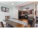 Eat-in kitchen with dark wood cabinets and black appliances at 2432 Summerhaven Loop, Conway, SC 29527