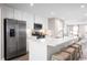 Modern kitchen with white cabinets, stainless steel appliances and island at 285 Bent Green Ct. # 76D, Murrells Inlet, SC 29576