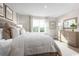 Bright and spacious main bedroom with neutral decor and ample natural light at 285 Bent Green Ct. # 76D, Murrells Inlet, SC 29576