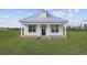 Craftsman style home with metal roof and front porch at 3368 Gurley Rd., Loris, SC 29569