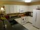 Well-equipped kitchen with white cabinets and appliances at 4331 River Gate Ln., Little River, SC 29566