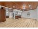 Modern kitchen with wood cabinets, island, and wood accent ceiling at 447 Bragdon Ave., Georgetown, SC 29440