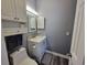 Well-appointed half bathroom with a pedestal sink and toilet at 4717 Wild Iris Dr. # 29-303, Myrtle Beach, SC 29577