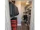 Spacious walk-in closet with custom shelving and hanging rods at 4717 Wild Iris Dr. # 29-303, Myrtle Beach, SC 29577