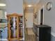 Entryway with a wooden curio cabinet and a small refrigerator at 4717 Wild Iris Dr. # 29-303, Myrtle Beach, SC 29577