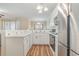 Kitchen with white cabinets, stainless steel appliances at 4823 Innisbrook Ct. # 703, Myrtle Beach, SC 29579