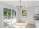 Bright dining area with sliding glass doors leading to deck at 494 Saluda River Rd., Myrtle Beach, SC 29588