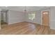 Bright dining area with hardwood floors and modern light fixture at 494 Saluda River Rd., Myrtle Beach, SC 29588