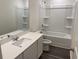 Clean bathroom with a white vanity, shower, and gray flooring at 528 Tillage Ct., Conway, SC 29526