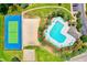 Aerial view of community amenities including pool, tennis, and sand volleyball courts at 5801 Oyster Catcher Dr. # 324, North Myrtle Beach, SC 29582