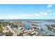 Aerial view of waterfront property with marina and ocean views at 5870 Longwood Dr. # 201, Murrells Inlet, SC 29576