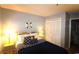 Cozy bedroom with a double bed, nightstands, and ample closet space at 5905 S Kings Highway # 545-B, Myrtle Beach, SC 29575