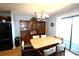 Dining area with wooden table and chairs, and built-in hutch at 5905 S Kings Highway # 545-B, Myrtle Beach, SC 29575