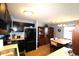 Kitchen features dark cabinets, modern appliances, and ample counter space at 5905 S Kings Highway # 545-B, Myrtle Beach, SC 29575