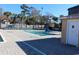 Small pool area with lounge chairs and restroom at 5905 S Kings Highway # 545-B, Myrtle Beach, SC 29575