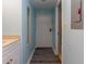 Hallway with light blue walls and wood-look floors at 5907 South Kings Hwy. # 308, Myrtle Beach, SC 29575