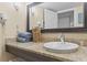 Bathroom with granite vanity and updated fixtures at 6900 Ocean Blvd. N # 1443, Myrtle Beach, SC 29572