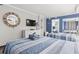 Bedroom with twin beds and access to balcony at 6900 Ocean Blvd. N # 1443, Myrtle Beach, SC 29572