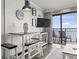 Small dining area with coastal decor and ocean views at 6900 Ocean Blvd. N # 1443, Myrtle Beach, SC 29572