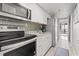 Kitchen with modern appliances and tile backsplash at 6900 Ocean Blvd. N # 1443, Myrtle Beach, SC 29572