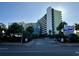 Oceanfront hotel building with palm trees and signage at 1105 S Ocean Blvd. # 334, Myrtle Beach, SC 29577