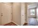 Bright entryway with neutral walls and laminate wood floors at 1192 River Oaks Dr. # 28-B, Myrtle Beach, SC 29579
