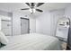 Bright bedroom with a queen bed, closet, and ensuite bath at 1210 N Waccamaw Dr. # 404, Garden City Beach, SC 29576