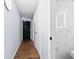 Clean hallway with wood floor at 1210 N Waccamaw Dr. # 404, Garden City Beach, SC 29576