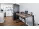 Home office space with a desk, laptop, and ample workspace at 1210 N Waccamaw Dr. # 404, Garden City Beach, SC 29576