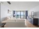 Living room with ocean view, comfortable seating, and fireplace at 1210 N Waccamaw Dr. # 404, Garden City Beach, SC 29576