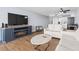 Living room with electric fireplace and kitchen access at 1210 N Waccamaw Dr. # 404, Garden City Beach, SC 29576