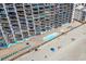 Oceanfront pool and beach access with lounge chairs at 1210 N Waccamaw Dr. # 404, Garden City Beach, SC 29576