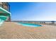 Resort-style pool with ocean views at 1210 N Waccamaw Dr. # 404, Garden City Beach, SC 29576