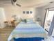 Bright bedroom with king-size bed, desk, and ocean view at 202 75Th Ave N # 5704/5705, Myrtle Beach, SC 29572