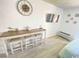 Small dining area with a wooden table and four chairs, ideal for a small Gathering at 202 75Th Ave N # 5704/5705, Myrtle Beach, SC 29572
