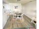 Charming dining area with round table and seating for four at 202 75Th Ave N # 5704/5705, Myrtle Beach, SC 29572