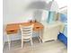 Desk with drawers, chair, and nightstand with lamp at 202 75Th Ave N # 5704/5705, Myrtle Beach, SC 29572
