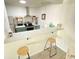 Modern kitchen with stainless steel appliances and breakfast bar at 202 75Th Ave N # 5704/5705, Myrtle Beach, SC 29572