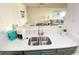 Modern kitchen featuring a double sink, quartz countertops, and stainless steel appliances at 202 75Th Ave N # 5704/5705, Myrtle Beach, SC 29572