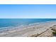 Aerial view showcasing expansive beach, ocean, and pier at 2501 S Ocean Blvd. # 1111, Myrtle Beach, SC 29577
