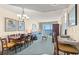 Spacious living room with ocean view, dining area, and seating at 2501 S Ocean Blvd. # 1111, Myrtle Beach, SC 29577