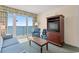 Living room with ocean view and comfortable seating at 2501 S Ocean Blvd. # 1111, Myrtle Beach, SC 29577