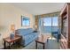 Living room with ocean view and comfortable seating at 2501 S Ocean Blvd. # 1111, Myrtle Beach, SC 29577