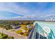 High-rise building and neighborhood aerial view, showcasing roads and landscape at 6804 N Ocean Blvd. # 1147, Myrtle Beach, SC 29572