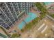 Aerial view of resort pool, bridge, and surrounding area at 6804 N Ocean Blvd. # 1147, Myrtle Beach, SC 29572