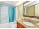 Bathroom boasts a shower/tub combo and updated vanity at 6804 N Ocean Blvd. # 1147, Myrtle Beach, SC 29572