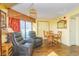 Living room with recliner chairs, dining table, and ocean view at 6804 N Ocean Blvd. # 1147, Myrtle Beach, SC 29572