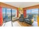 Relaxing living room featuring two recliners and access to a balcony at 6804 N Ocean Blvd. # 1147, Myrtle Beach, SC 29572